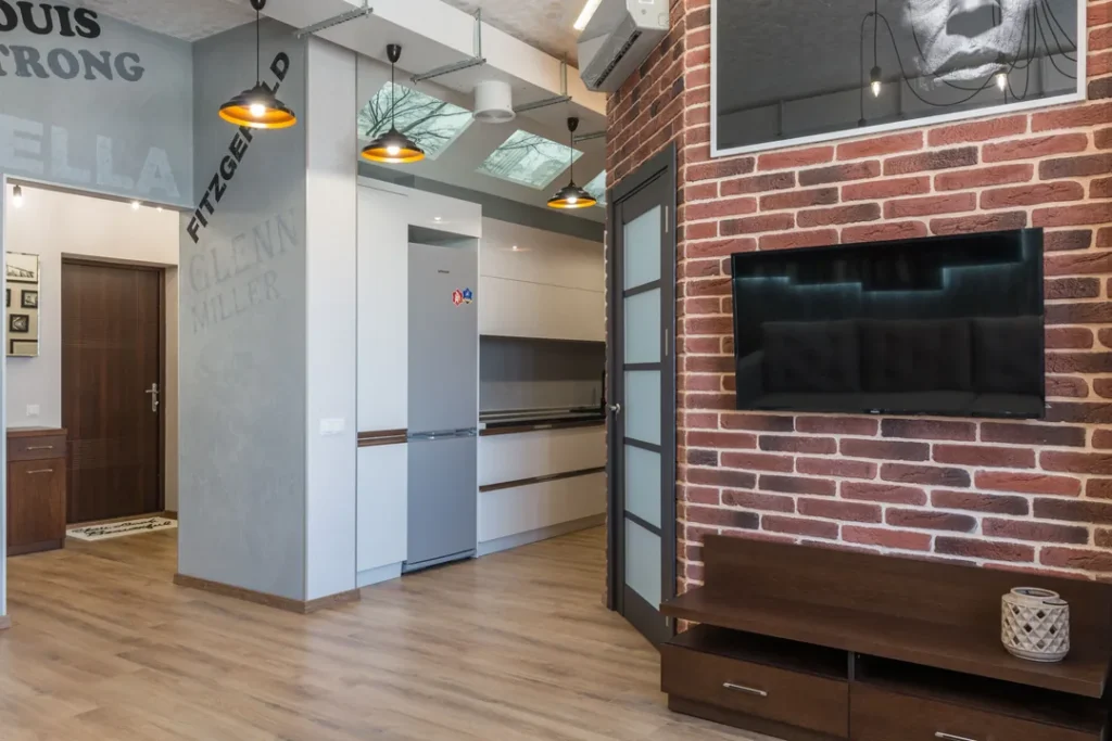 Sala de estar decorada com móveis modernos alugados e eletrodomésticos